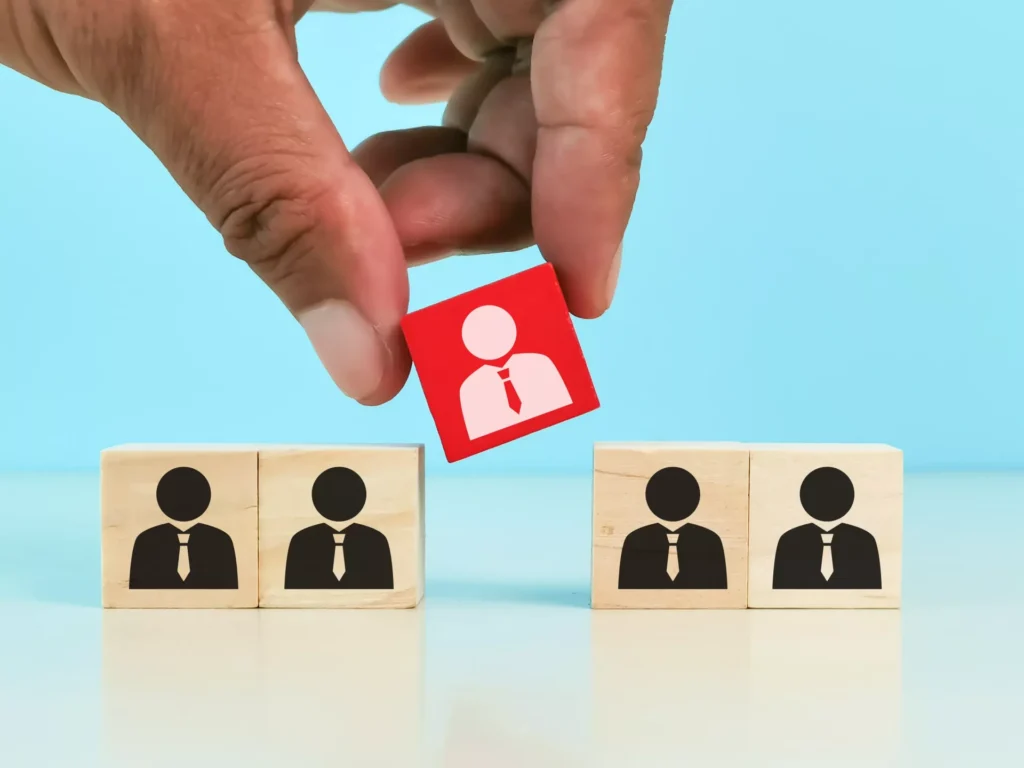 Image of someone selecting a block representng a perosn